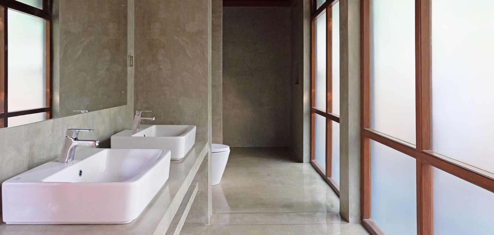 Dual sinks in villa bathroom at Aarunya Resort