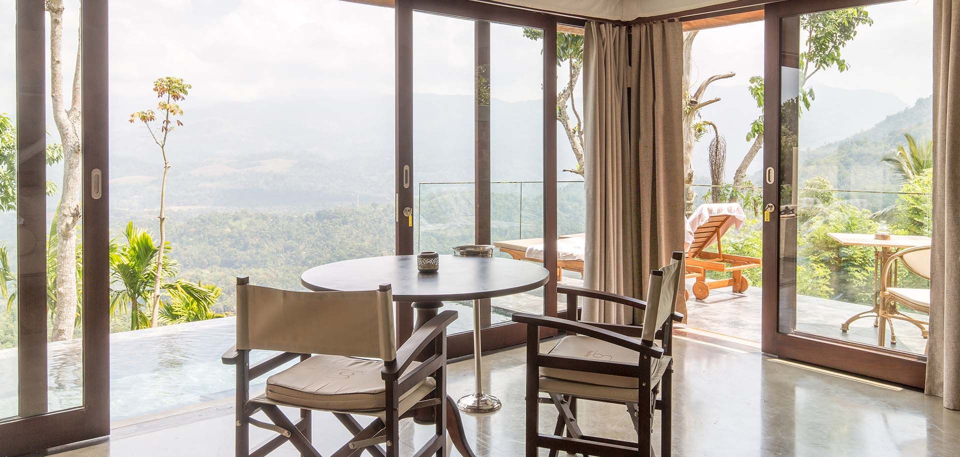 Outdoor verandah with chairs and a dining table