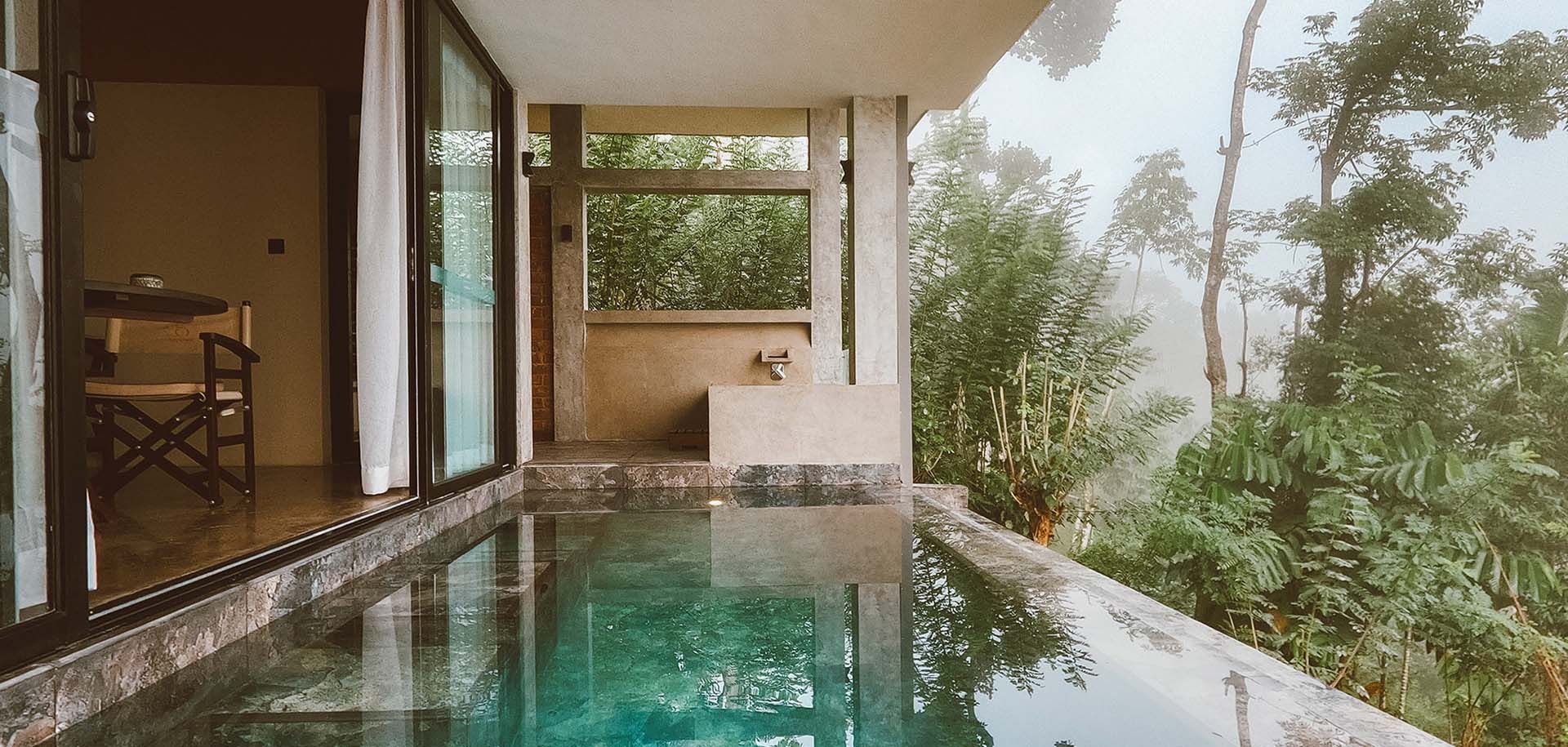 Private outdoor bathtub and plunge pool at Aarunya's Villa