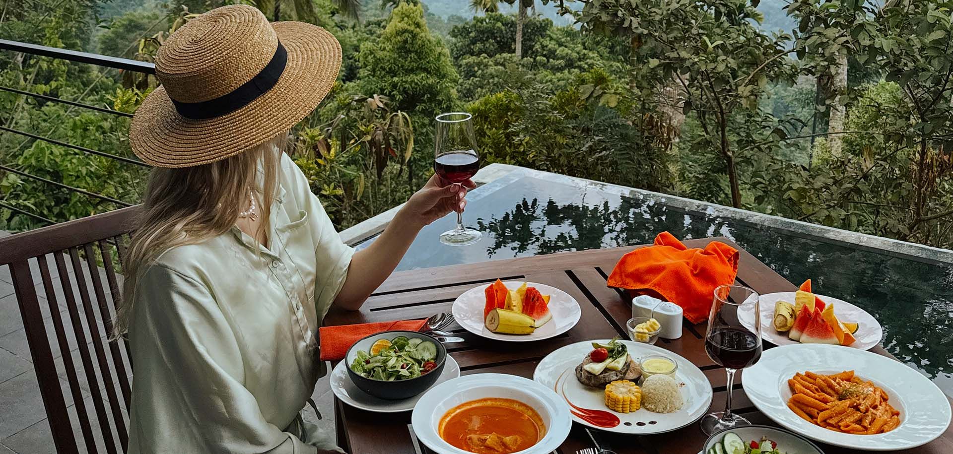 Guest enjoying a meal with a view at Aarunya Nature Resort