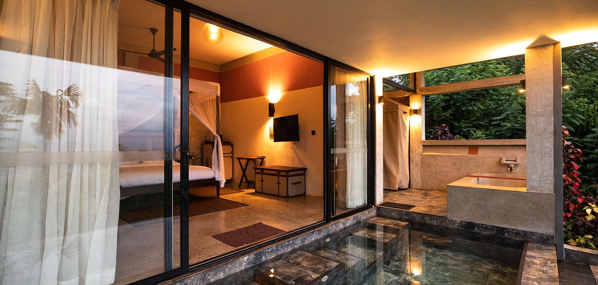 Private outdoor bathtub and plunge pool at Aarunya's Sky Habitat Villa