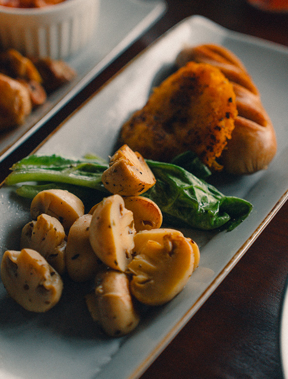 Plate of grilled mushrooms at Aarunya Nature Resort
