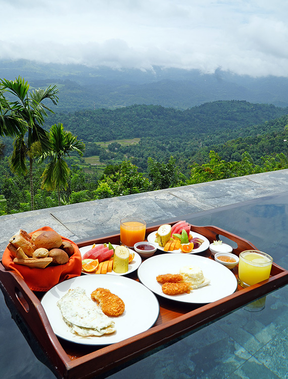 Floating breakfast served in a private plunge pool at Aarunya Nature Resort
