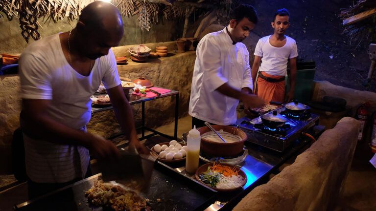 Chefs preparing kottu and hoppers at Aarunya Nature Resort