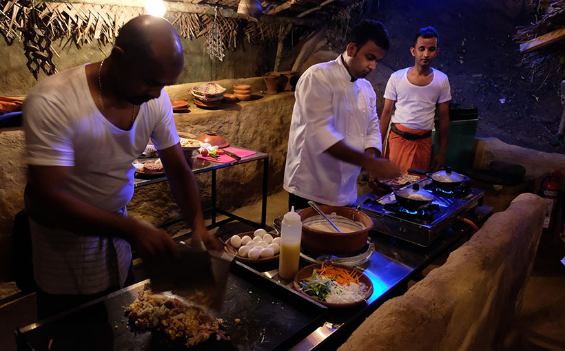Chefs preparing kottu and hoppers at Aarunya Nature Resort
