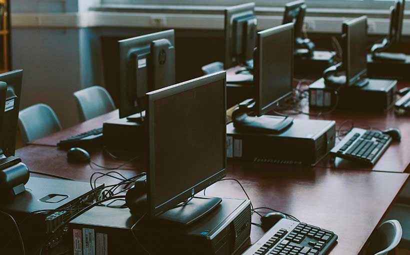 Computers in a village IT lab at the Buddhist temple