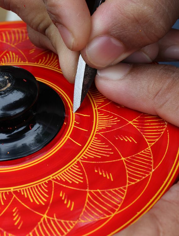 Crafting wooden Laksha bowls at Aarunya Nature Resort