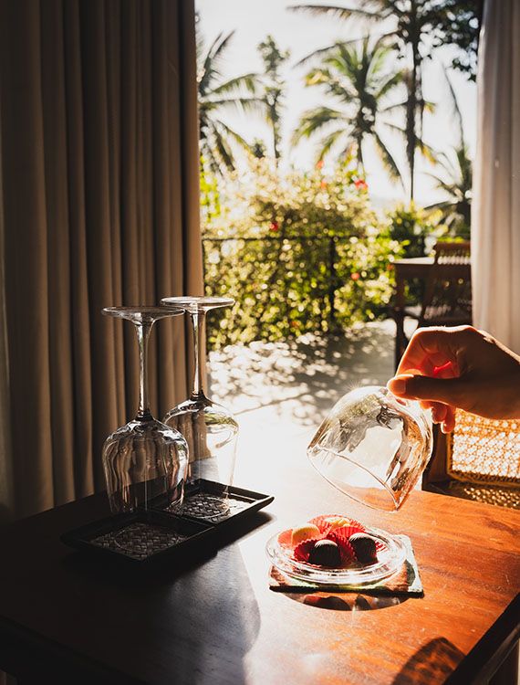 Handmade chocolates in a glass container at Aarunya Nature Resort
