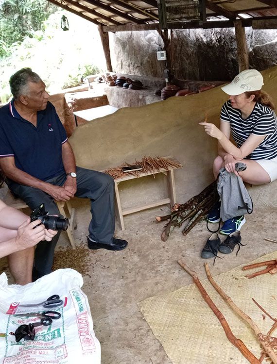Cinnamon peeling session guided by a local expert at Aarunya Estate