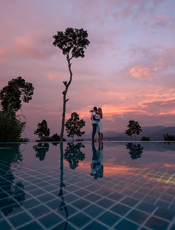 Couple enjoying romantic moment amidst sunset at Aarunya
