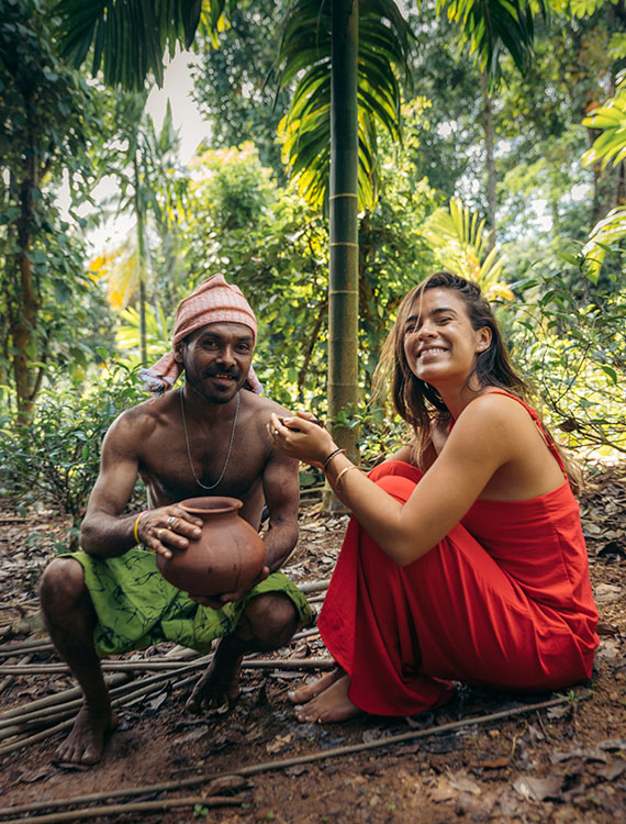 Guest experiencing toddy tapping at Aarunya Nature Resort