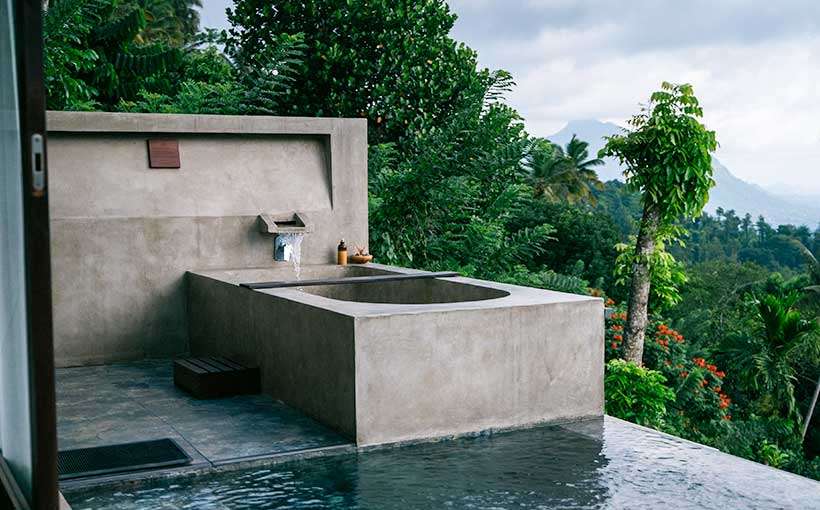 Outdoor pool and jacuzzi at Aarunya Nature Resort