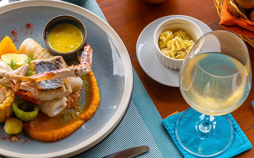 Exotic seafood dish with wine at Aarunya